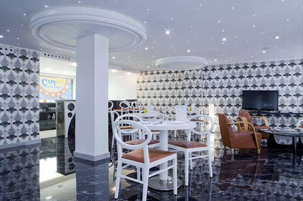 Фото Hotel La Boutique Puerta Osario