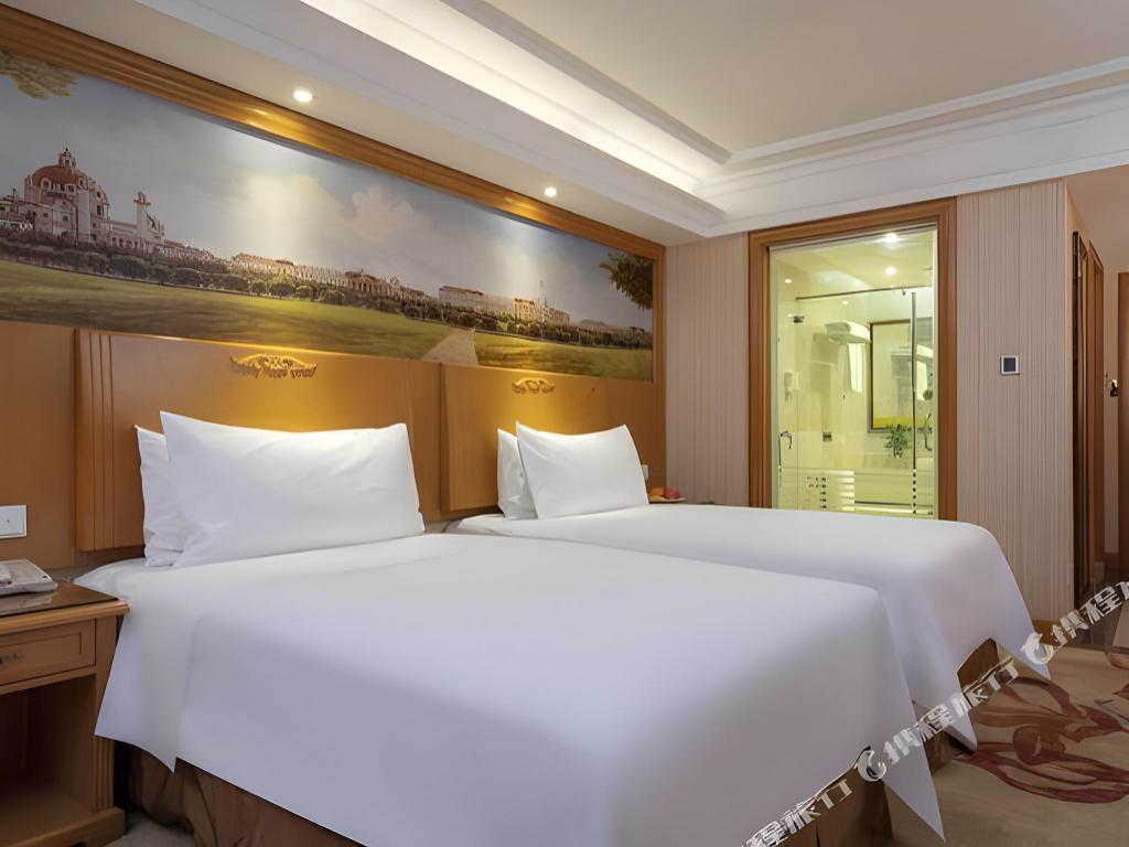 Фото Vienna International Hotel Guang'anmen