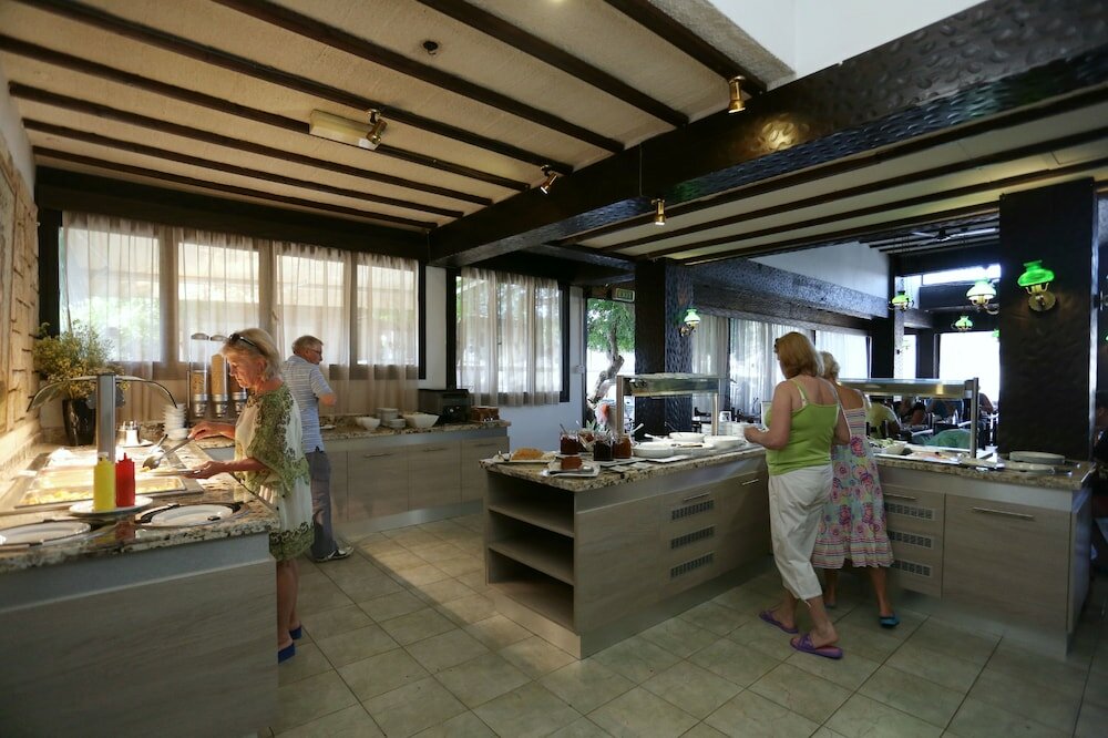 Фото Dionysos Central Hotel