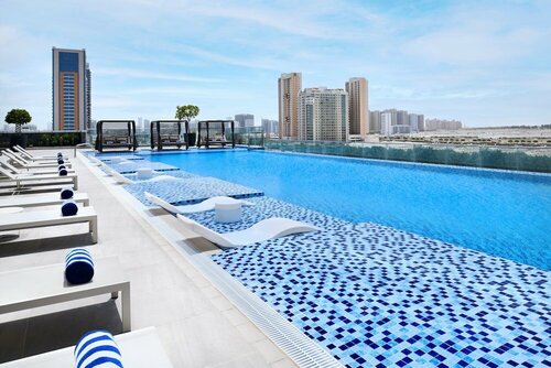 Гостиница Mövenpick Hotel Jumeirah Village Triangle в Джебель-Али