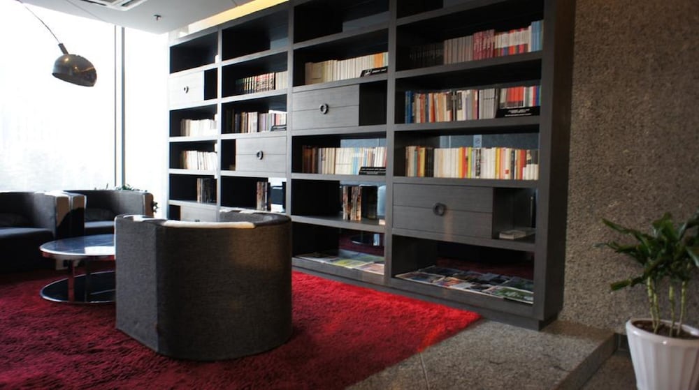 Фото Qingdao Housing International Hotel