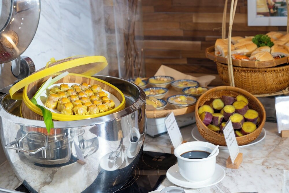 Фото Winsuites Saigon Hotel