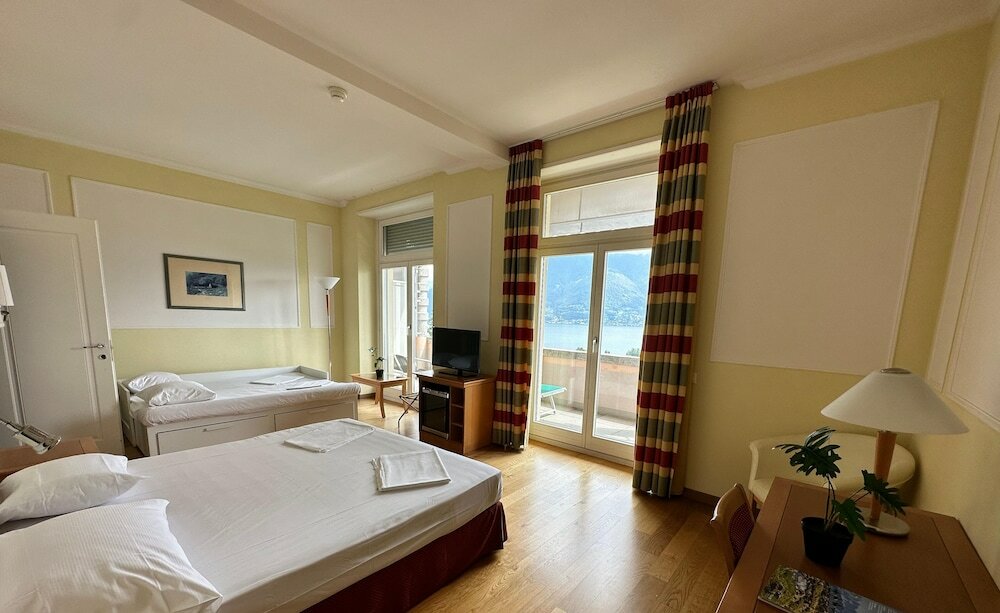 Фото E-Rooms Minusio