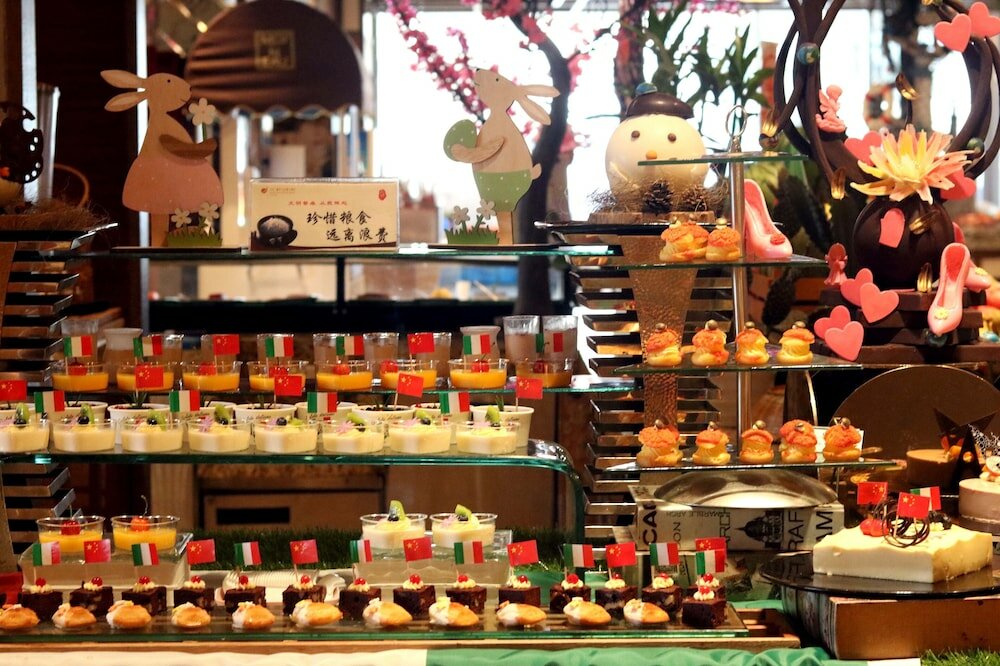 Фото Sanding New Century Grand Hotel Yiwu