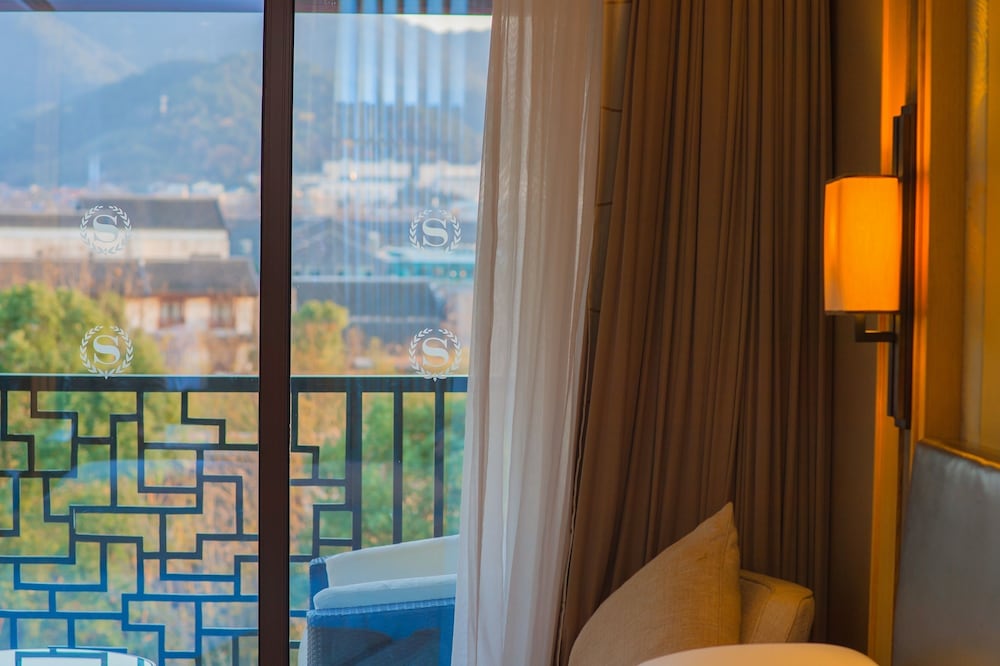 Фото Sheraton Grand Hangzhou Wetland Park Resort