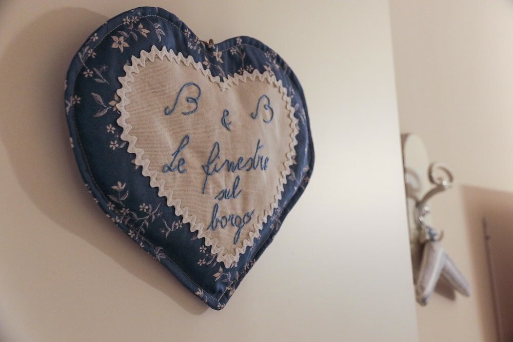 Фото Le Finestre Sul Borgo Rooms