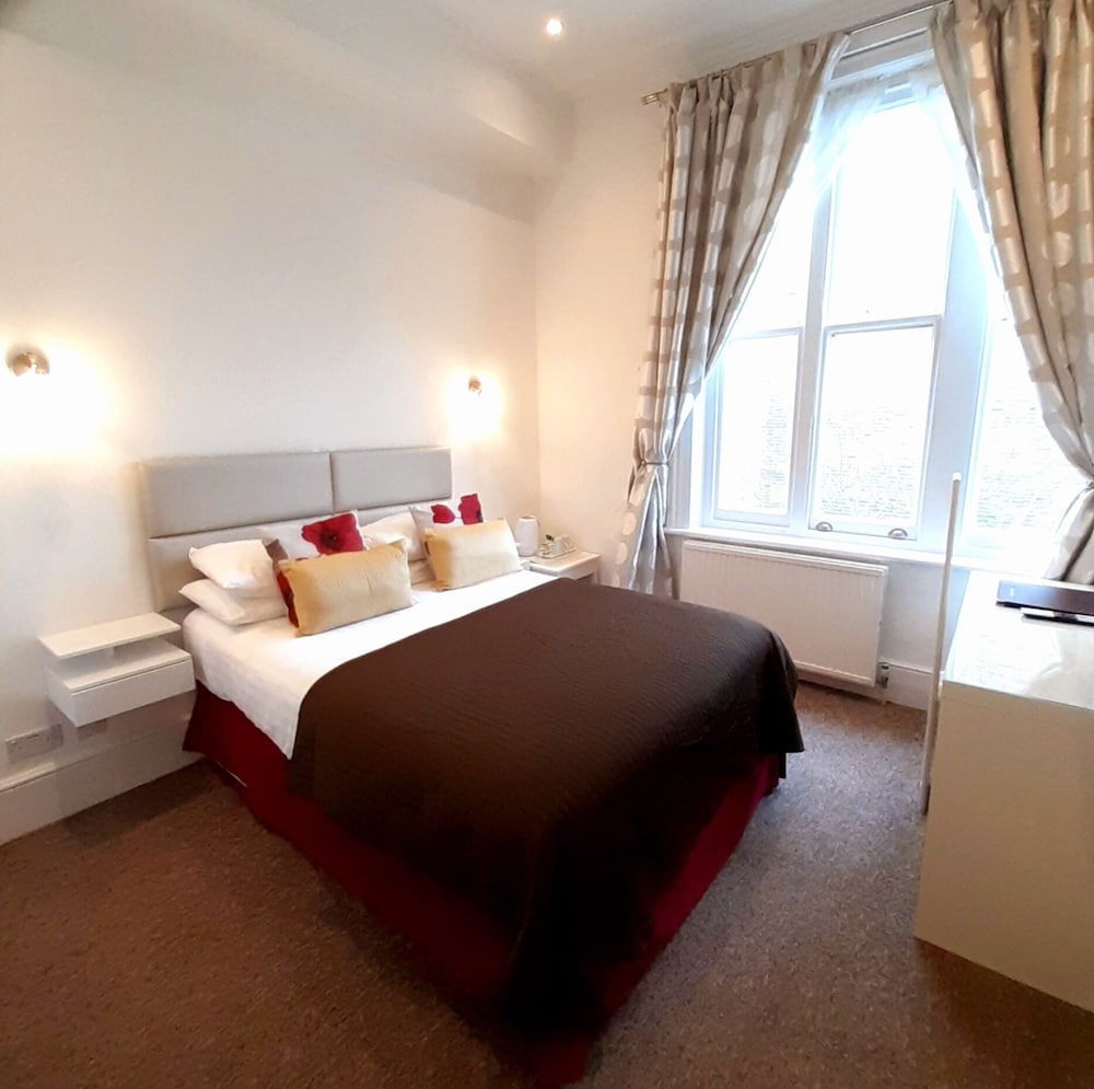 Фото Rushmore Hotel