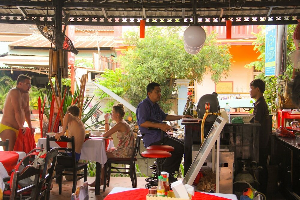 Фото Tropical Breeze Guesthouse