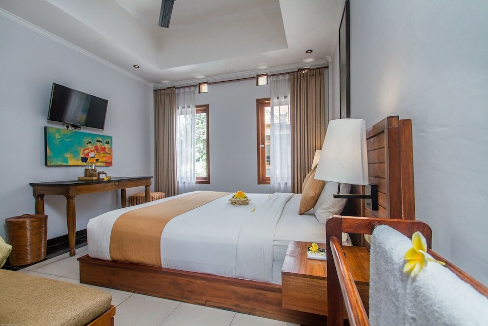 Фото Hartaning House by Pramana Villas