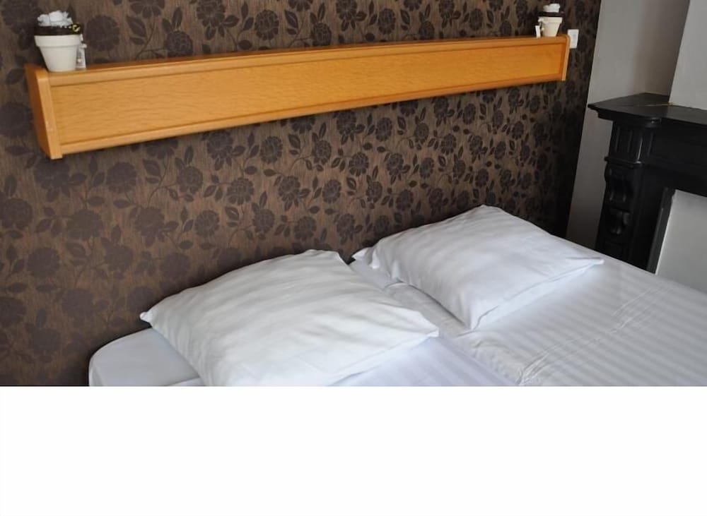 Фото Amsterdam Inn Hotel