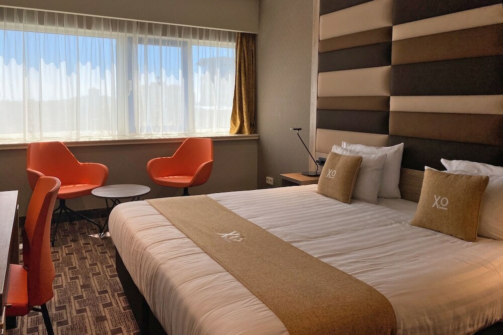 Фото Xo Hotels Blue Tower