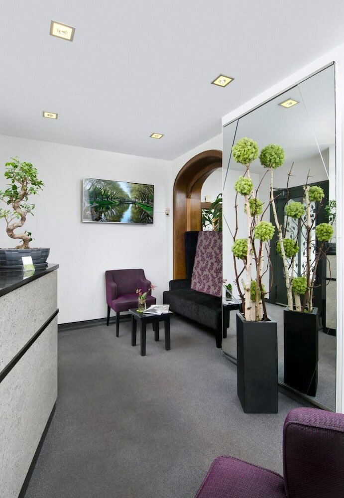 Фото Hotel Am Hofgarten