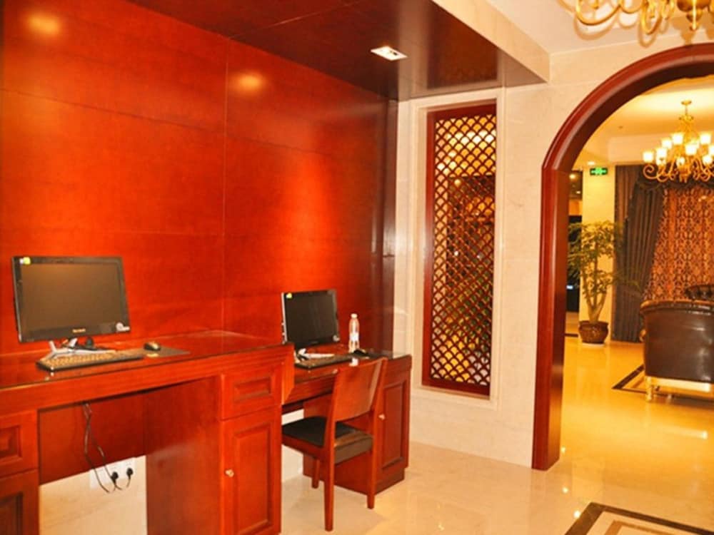 Фото GreenTree Inn Taizhou Taixing East Guoqing Road Rt Mart Business Hotel