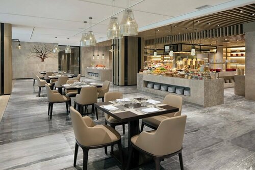 Внешний вид отеля Courtyard by Marriott Zhengzhou Airport в Чжэнчжоу, фото 4