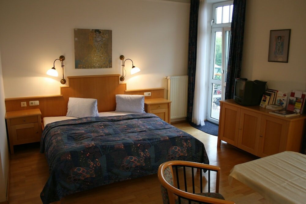 Фото Romantik Residenz Ferienwohnungen Hotel Im Weissen Rössl