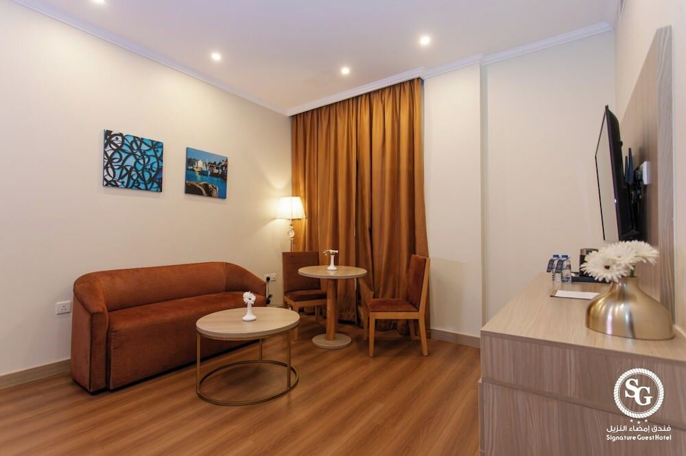 Фото Signature Guest Hotel