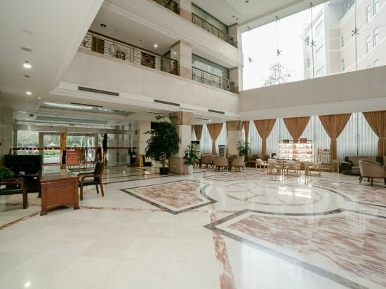 Фото Shi You Yuan Hotel