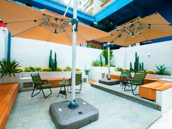Фото Naive L Executive Apartments Coast City
