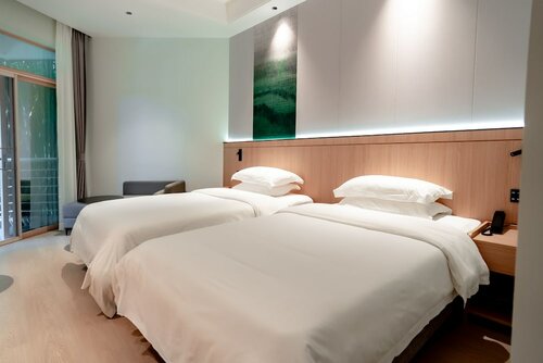Гостиница Zte Hotel Da Mei Sha в Лунгане