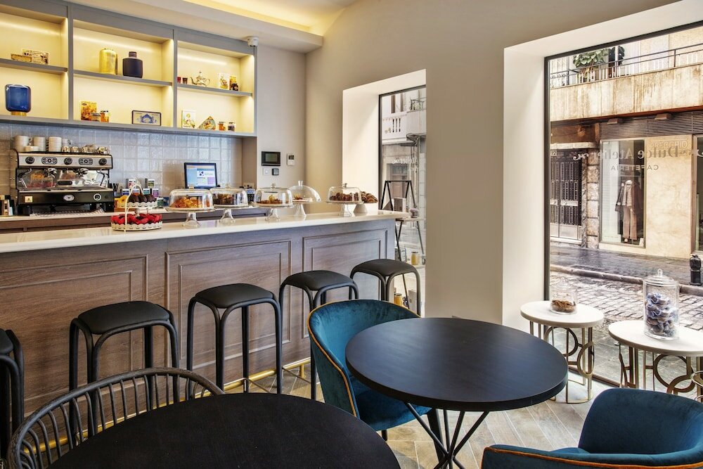 Фото Eurostars Puerta Real Hotel