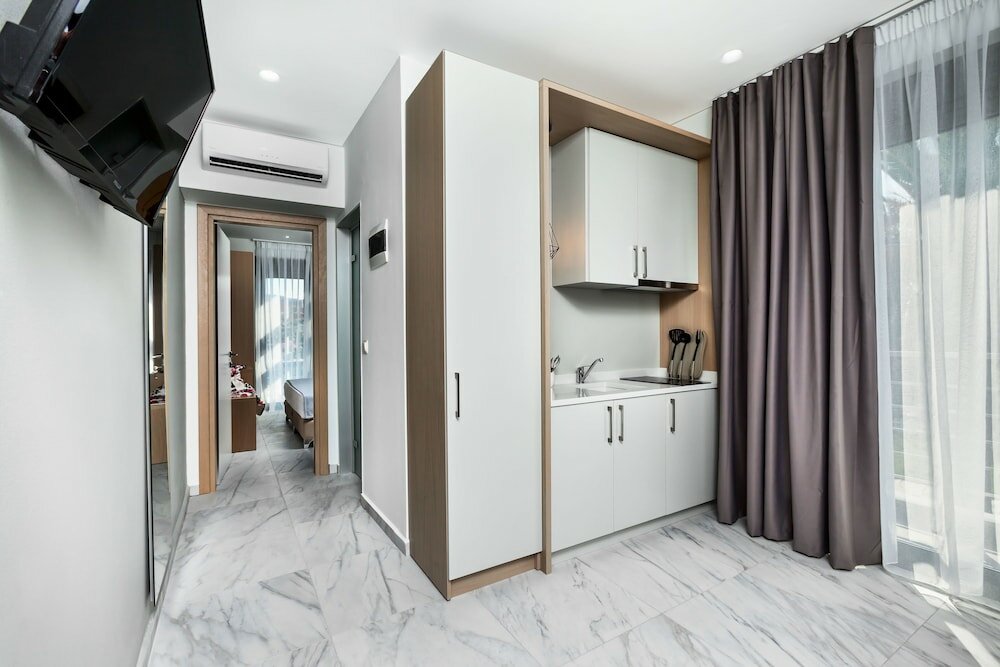 Фото Nymphes Deluxe Accommodation