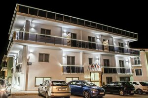 отель Anemos Rooms & Apartments