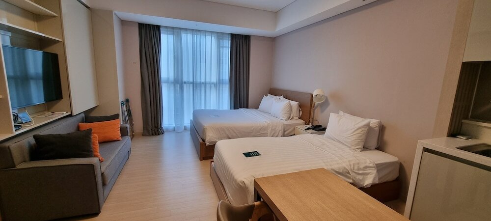 Фото Golden Tulip Incheon Airport Hotel & Suites