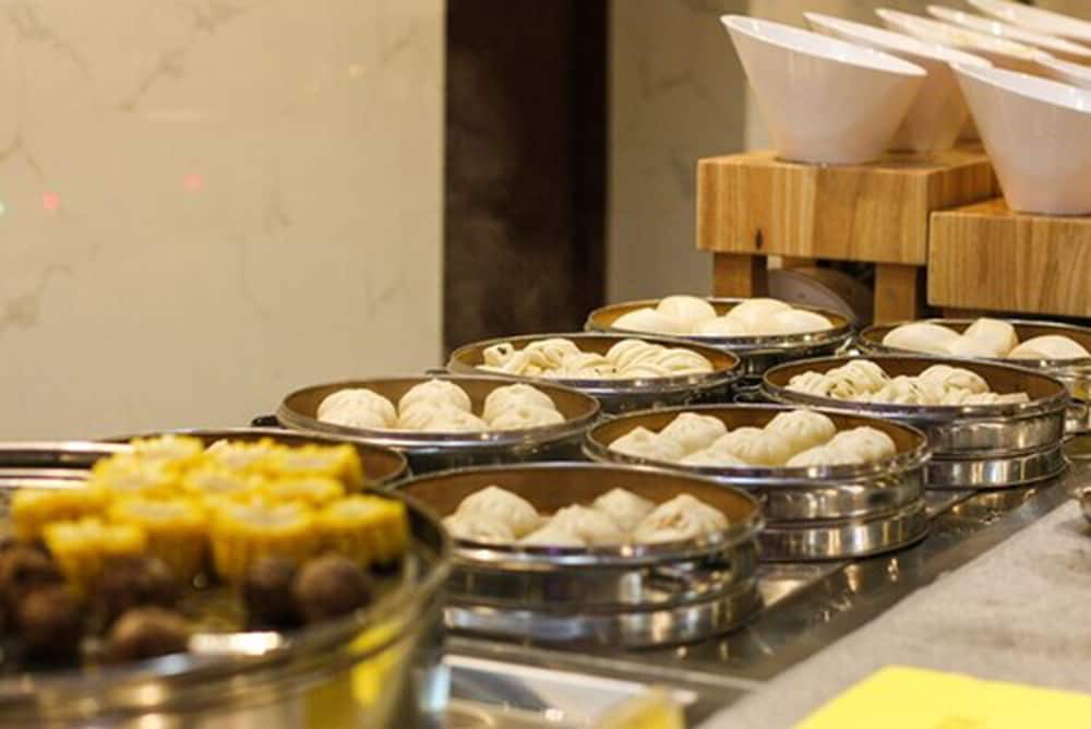 Фото Maison New Century Hotel Cixi