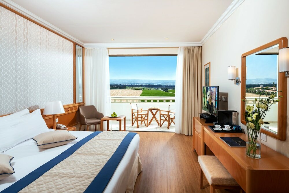 Фото Constantinou Bros Athena Beach Hotel