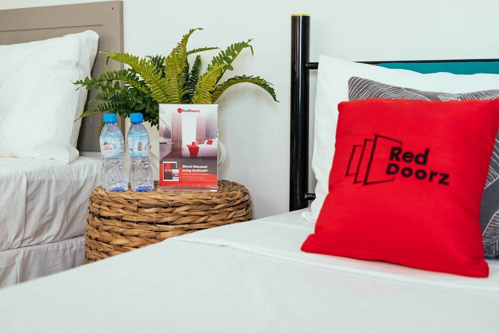 Фото Oyo 443 Maria Cristina Arcade Suites