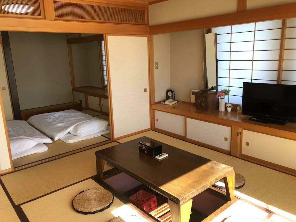 Фото Fujinoya Ryokan