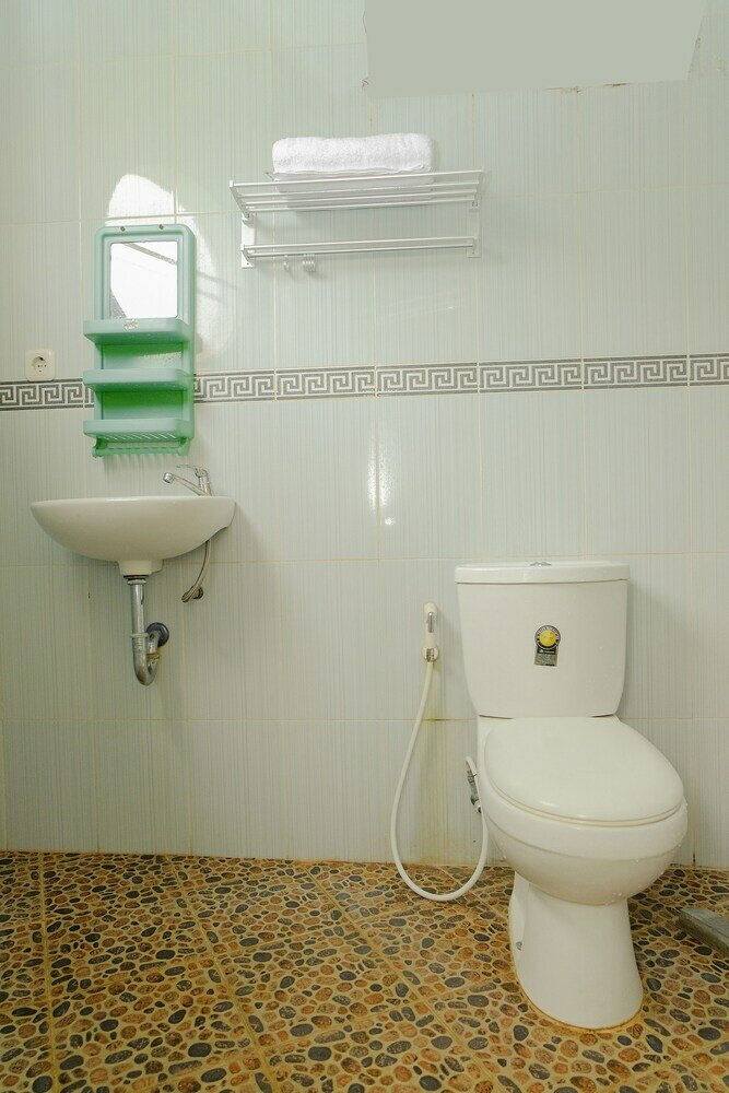 Фото Oyo 414 Loji Rejo Guest House