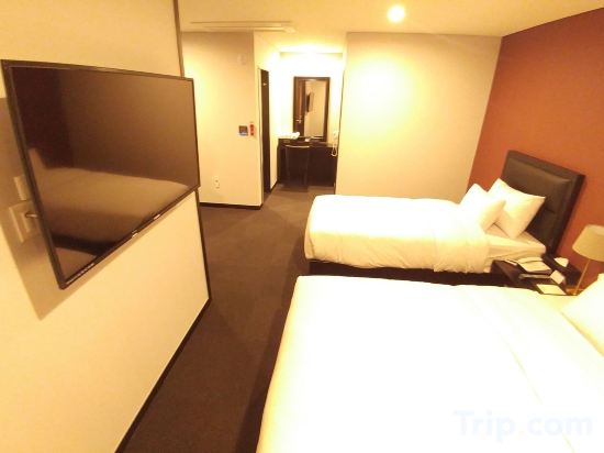 Фото Gangneung Tourist Hotel