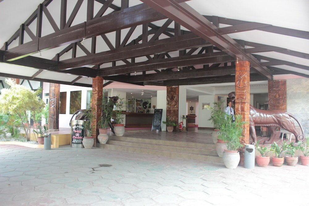 Фото Wild Orchid Beach Resort