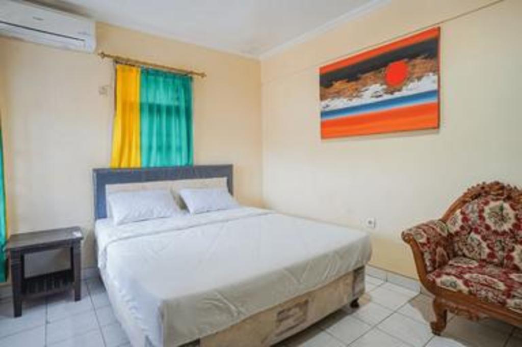 Фото Taman Mekar Beach Inn 2