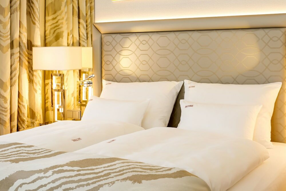 Фото Boutiquehotel Das Tyrol