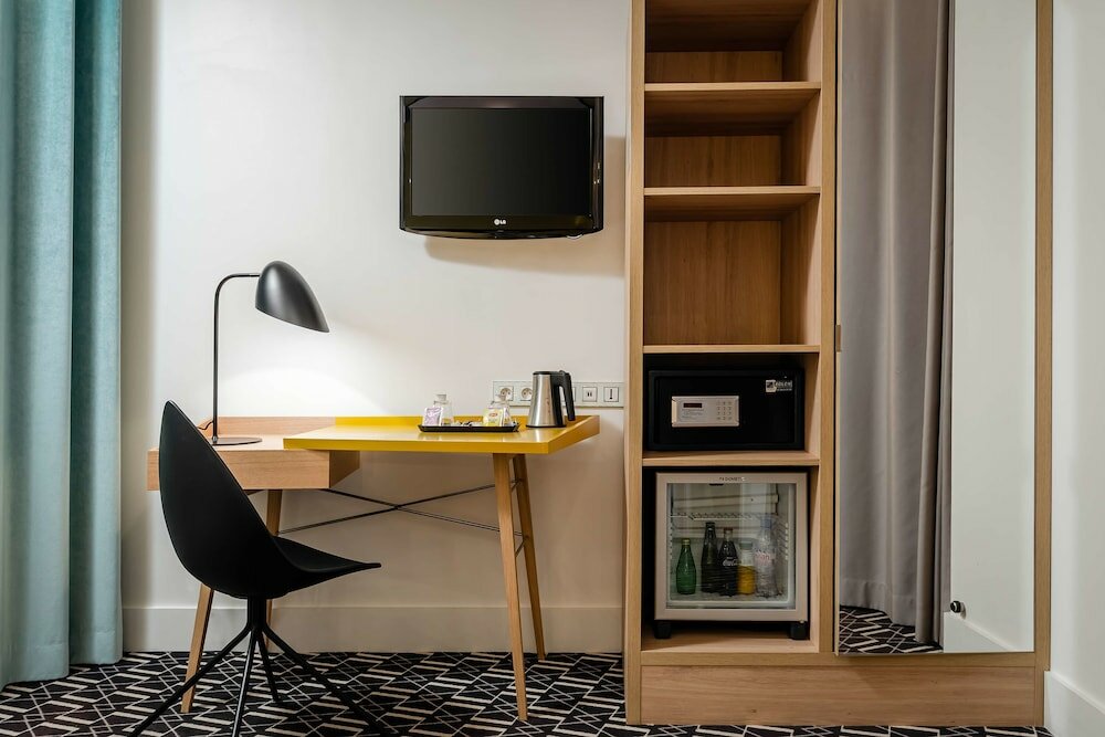 Фото Hotel Arc de Triomphe