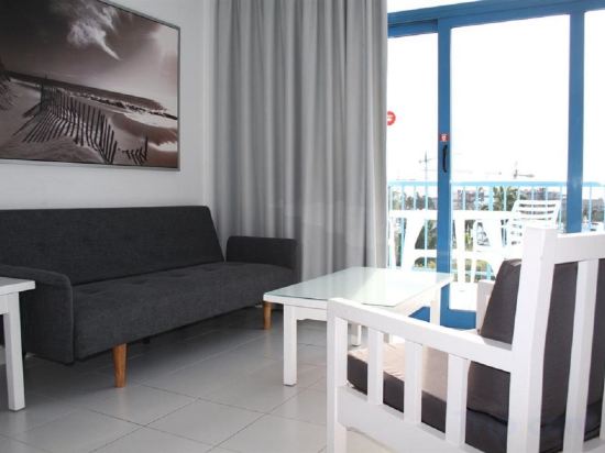 Фото Apartahotel Costa Volcán