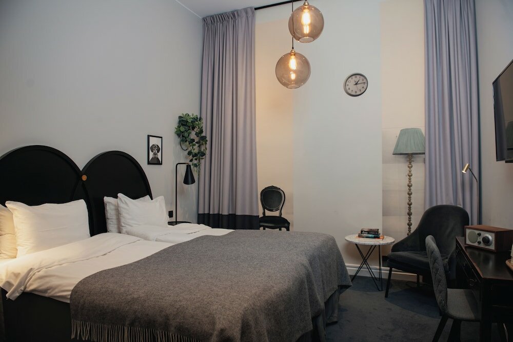 Фото Home Hotel Borgen