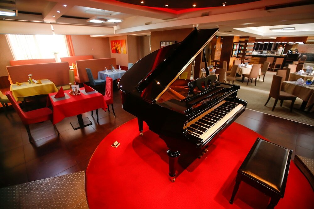 Фото The Corporate Hotel Central