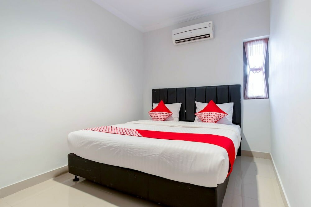 Фото Oyo 283 Helvetia Residence