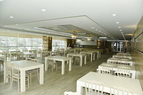 Гостиница Cevaher Hotel & Suites в Йомре