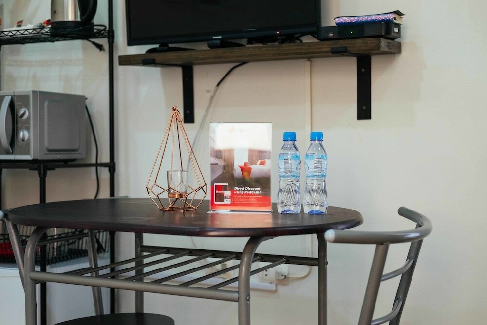 Фото Oyo 443 Maria Cristina Arcade Suites