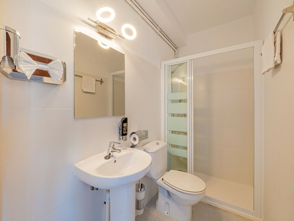 Фото Hostal Port Corona