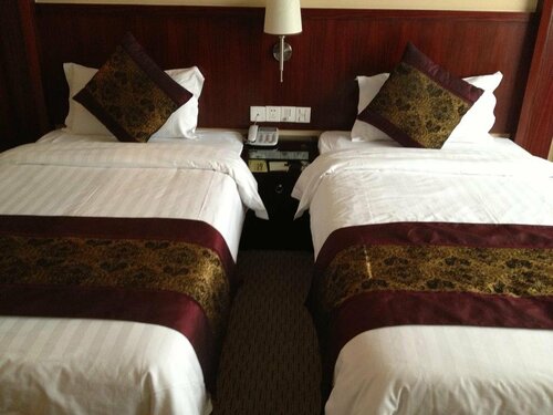Гостиница Super 8 Hotel Shaoxi Shengyuan в Шаосине