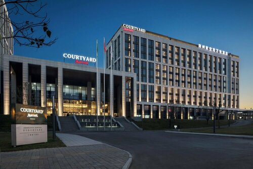 Внешний вид отеля Courtyard by Marriott Zhengzhou Airport в Чжэнчжоу, фото 1