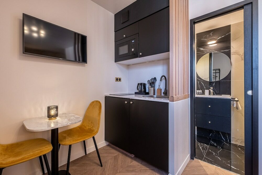 Фото Mijo's Appartements Hôtel