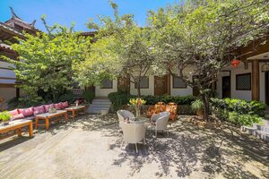 Гостиница Merry Inn Lijiang