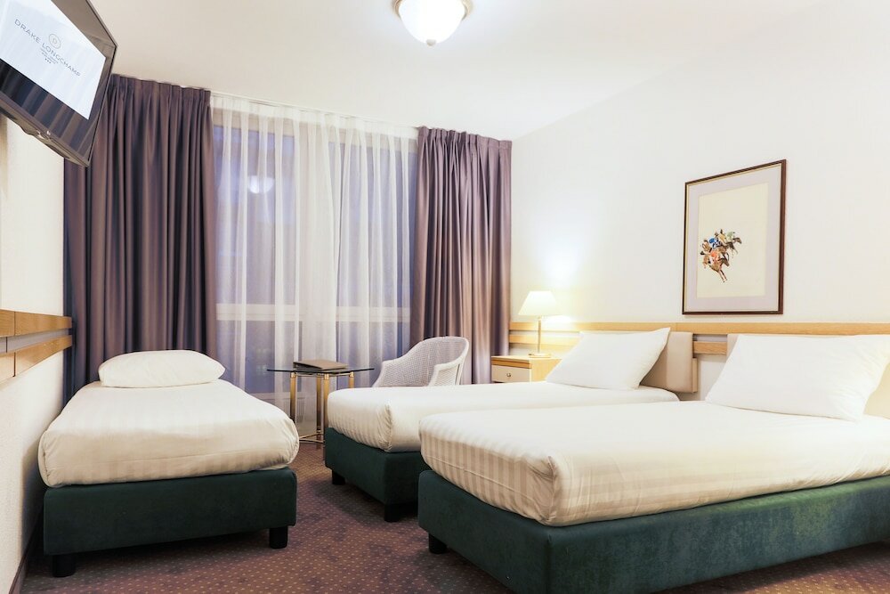 Фото Drake Longchamp