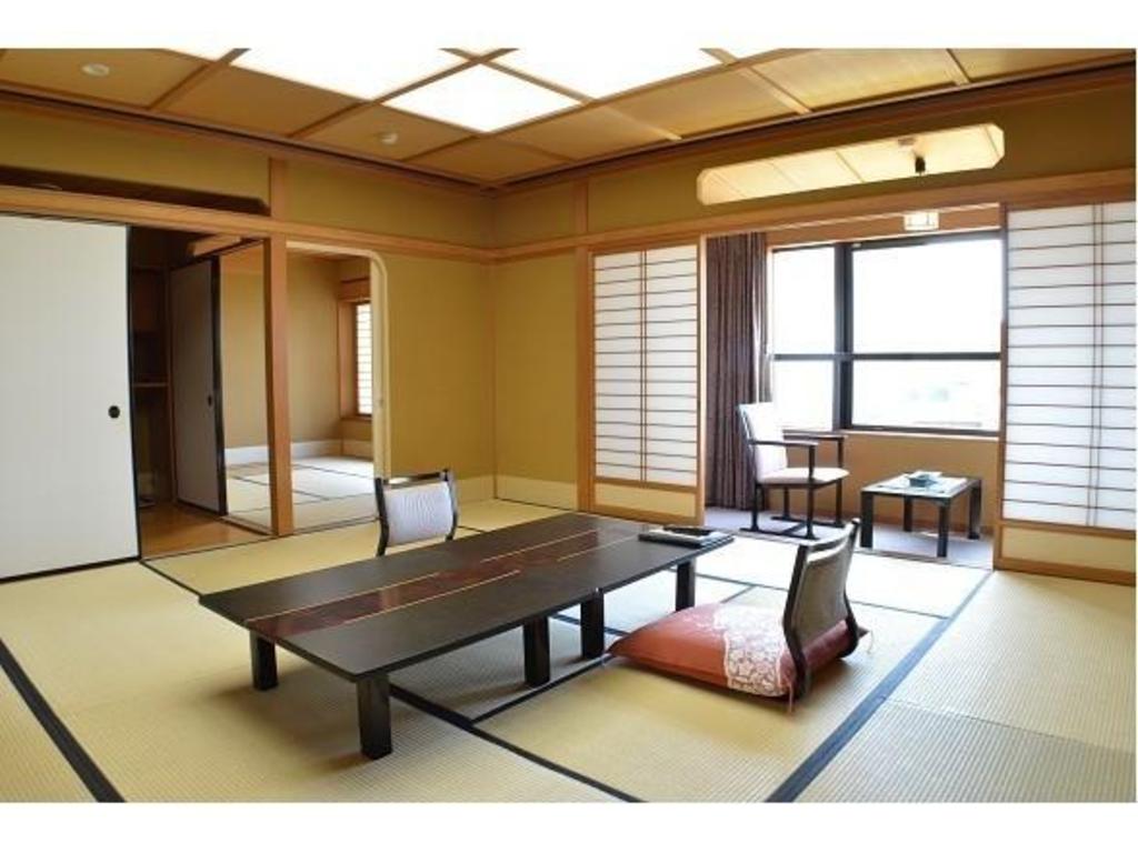 Фото Katayamazu Onsen Kanoya Korakuen